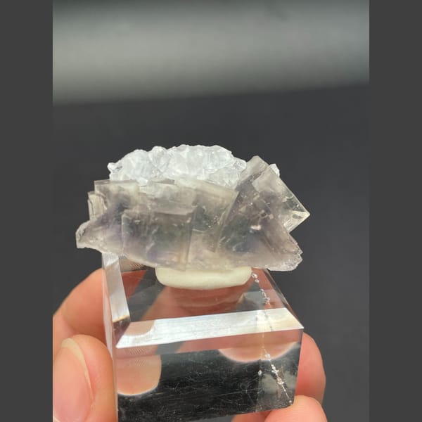 Translucent pale fluorite with frosted top and blue heart from Zhejiang — alternate view