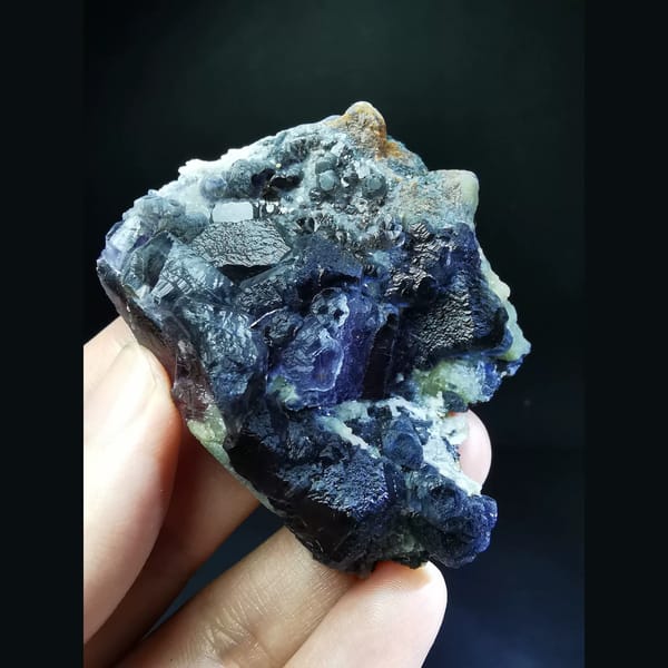 Purple fluorite cluster with combined forms — complete view