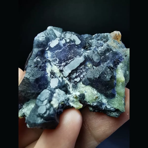 Purple fluorite cluster with combined forms — detail view