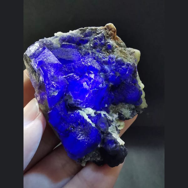 Purple fluorite cluster with combined forms — detail view