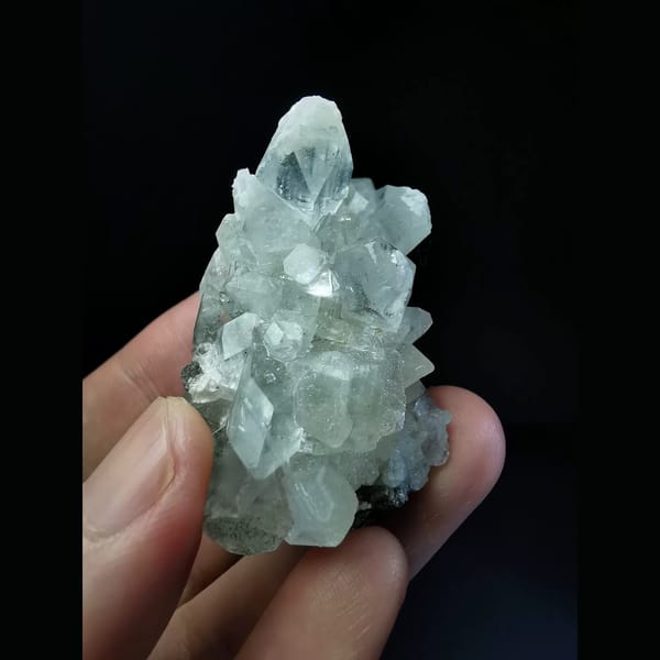 Glassy apophyllite crystal cluster — detail view