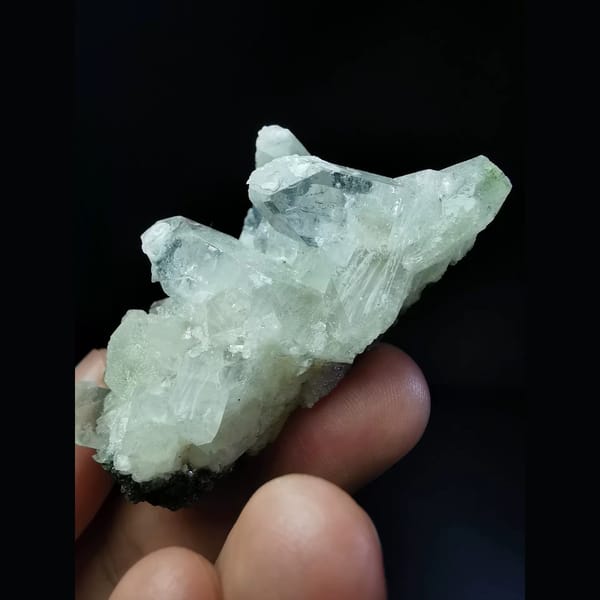 Glassy apophyllite crystal cluster — detail view