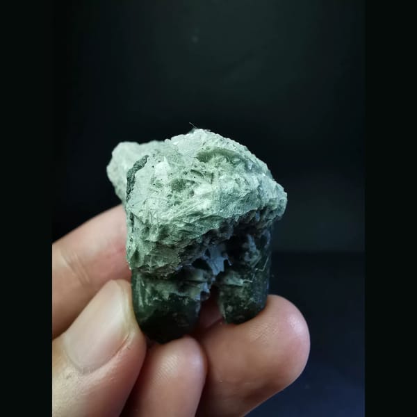 Forest green quartz with a green calcite ball — detail view