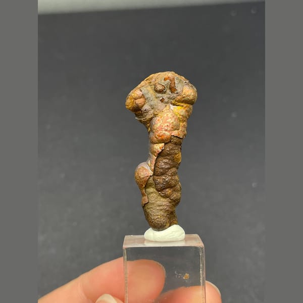 Knobbly brown stalactitic limonite from Guizhou — alternate view