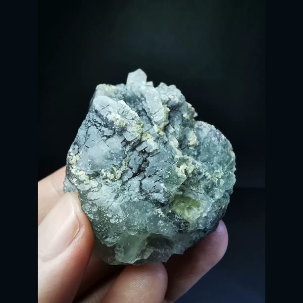 Stepped blue-purple fluorite with quartz — complete view