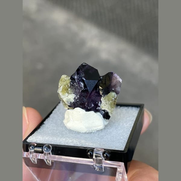 Dark purple fluorite with greenish mica from Inner Mongolia — complete view