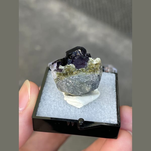 Dark purple fluorite with greenish mica from Inner Mongolia — alternate view