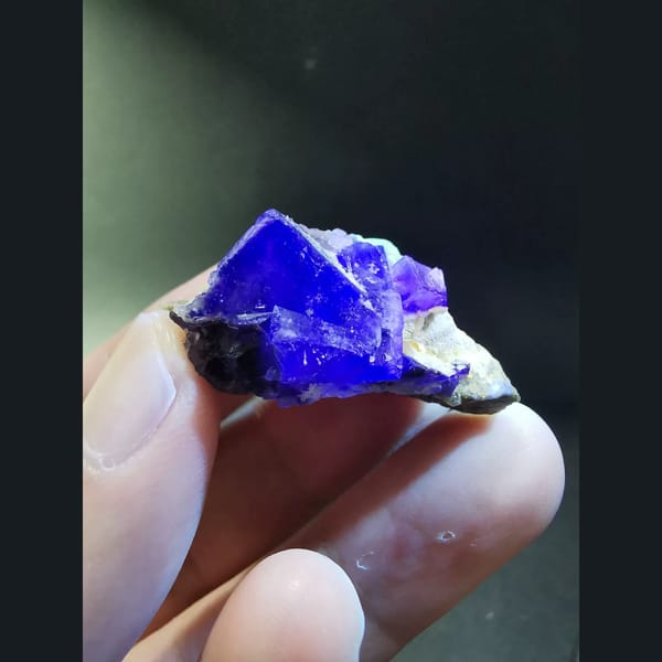 Purple-edged fluorite on matrix — detail view