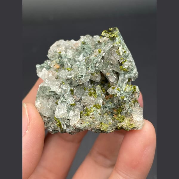 Glassy green phantom quartz with dark green epidote from Meigu, Sichuan — complete view