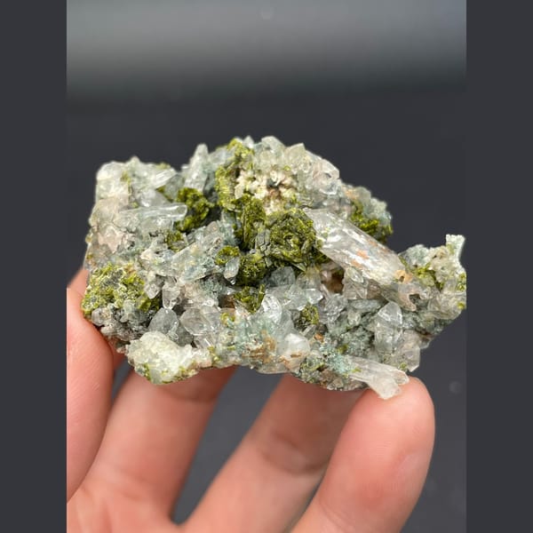 Glassy green phantom quartz with dark green epidote from Meigu, Sichuan — alternate view