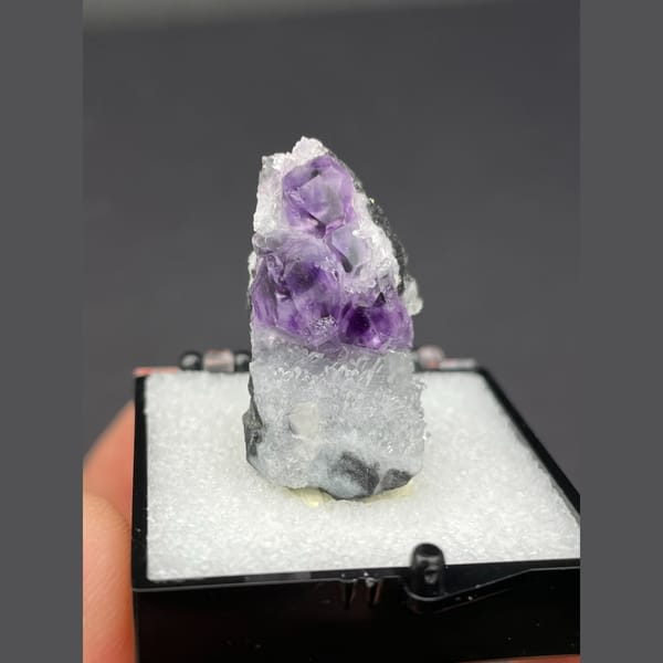 Purple fluorite cubes on white quartz from Fujian — alternate view