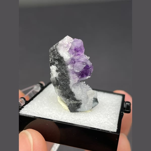 Purple fluorite cubes on white quartz from Fujian — alternate view