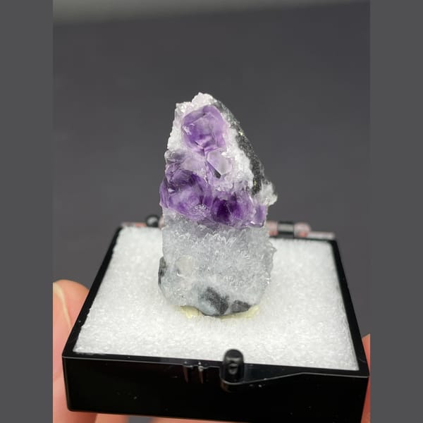 Purple fluorite cubes on white quartz from Fujian — detail view