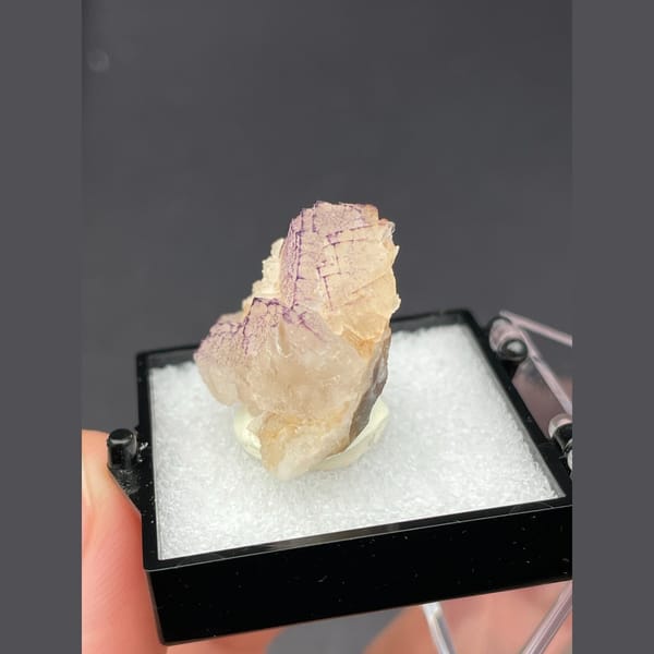Peach fluorite with purple grid-like edges from Guizhou — alternate view