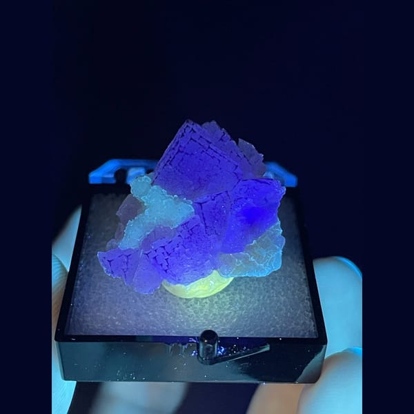 Peach fluorite with purple grid-like edges from Guizhou — detail view