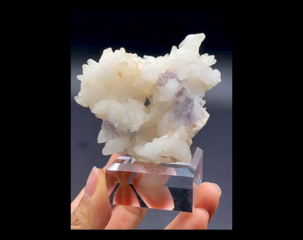 Complete wider front view of the same stepped phantom fluorite and calcite specimen