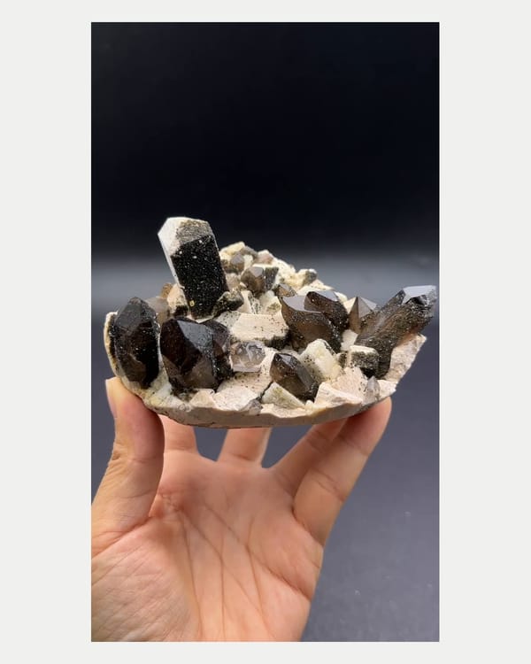 Complete front view of Yunxiao smoky quartz with feldspar and mica