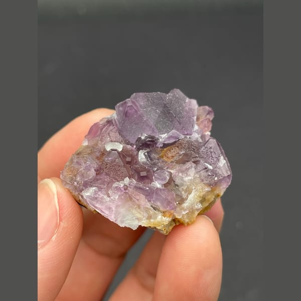 Lavender purple fluorite cube cluster from Zhejiang — complete view