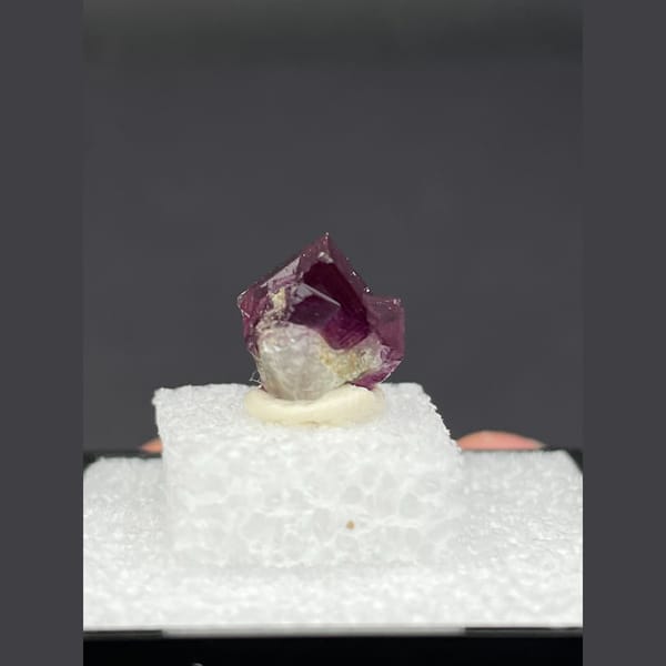 Tiny magenta purple fluorite crystal from Anhui — alternate view