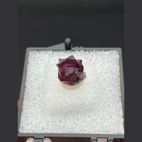 Tiny magenta purple fluorite crystal from Anhui — detail view
