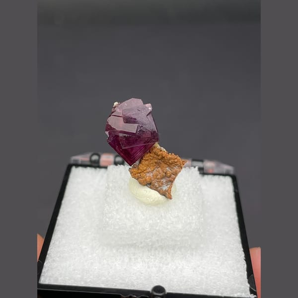 Magenta fluorite crystal with native copper from Anhui — alternate view