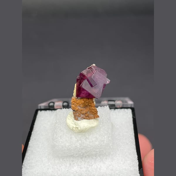 Magenta fluorite crystal with native copper from Anhui — detail view