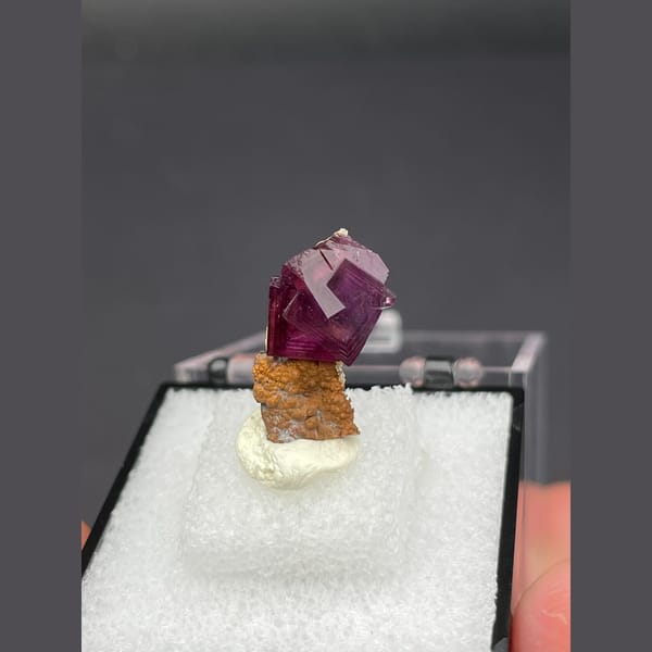 Magenta fluorite crystal with native copper from Anhui — detail view