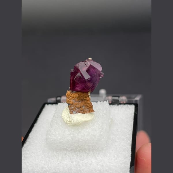 Magenta fluorite crystal with native copper from Anhui — detail view