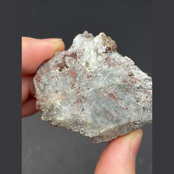 Pale yellow calcite balls on sparkly quartz from Hubei — detail view