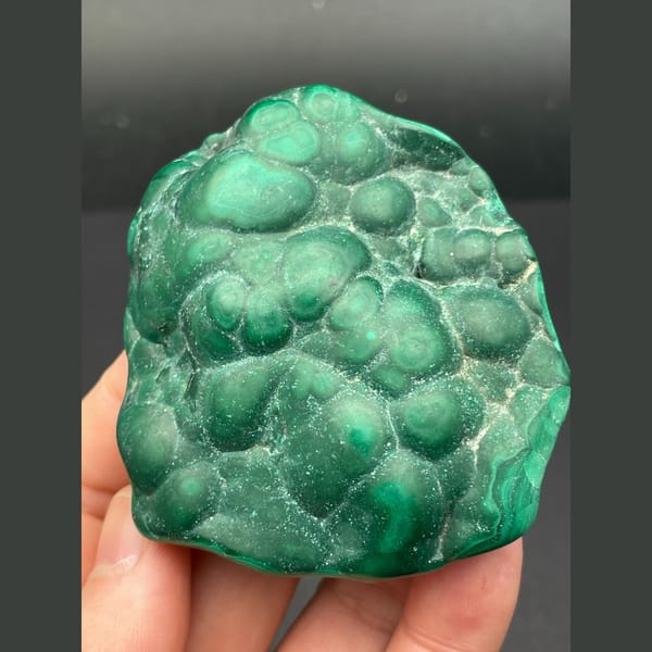 Glossy green botryoidal malachite from the Congo — complete view