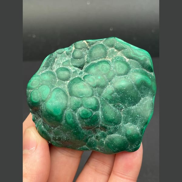 Glossy green botryoidal malachite from the Congo — detail view
