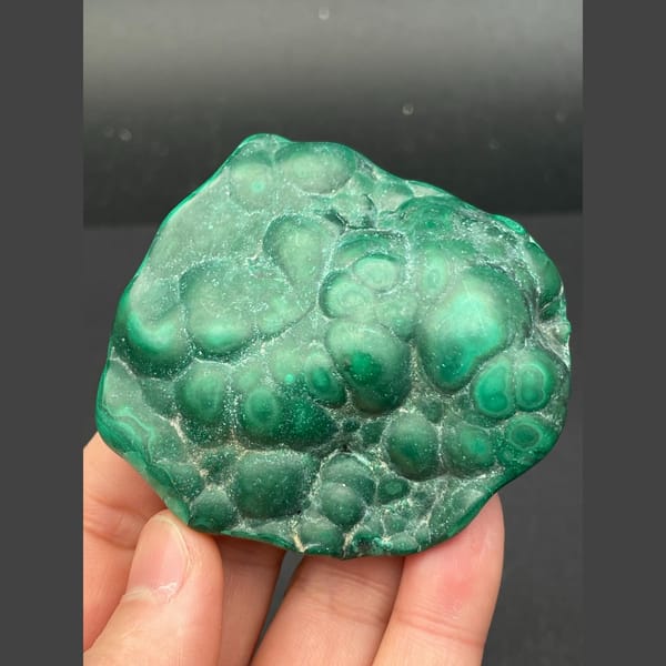 Glossy green botryoidal malachite from the Congo — detail view