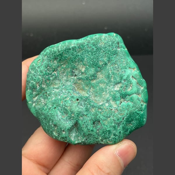 Glossy green botryoidal malachite from the Congo — detail view