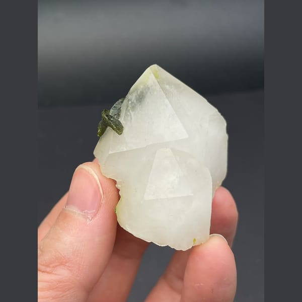 Milky quartz points with dark green epidote from Sichuan — alternate view