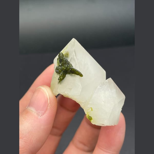 Milky quartz points with dark green epidote from Sichuan — detail view