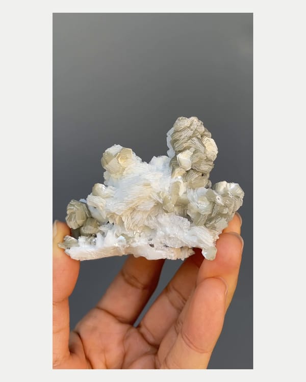 Complete front view of mica cleavelandite and tourmaline from Pakistan