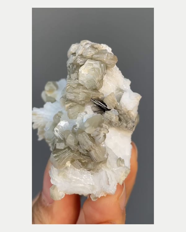 Complete left side view of layered mica books