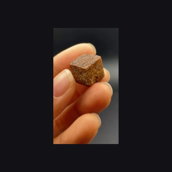 Whole dodecahedral andradite garnet from Hebei, front view