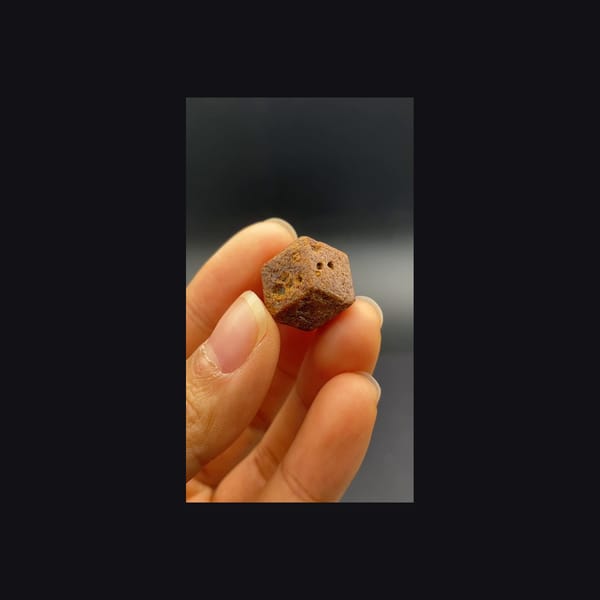 Whole dodecahedral andradite garnet from Hebei, right view