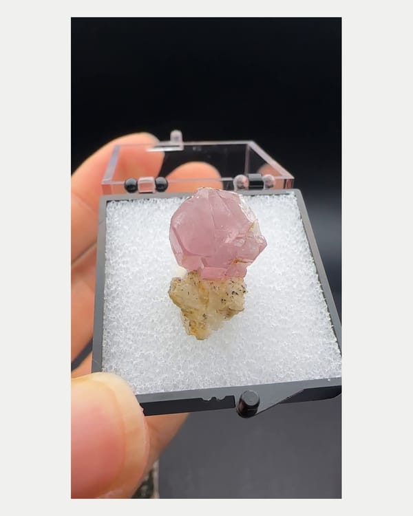 Complete right oblique view of miniature pink apatite