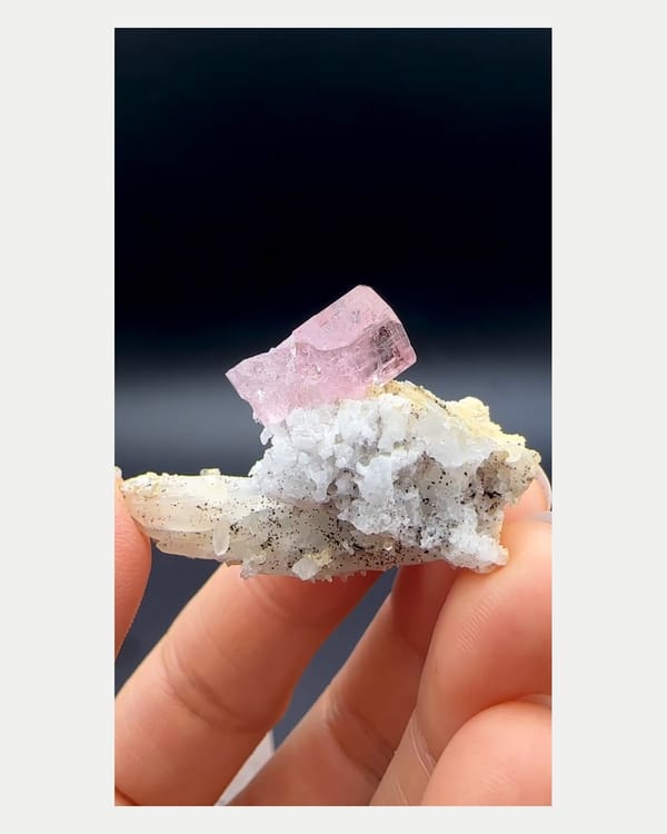 Complete front view of pink apatite with quartz from Pakistan