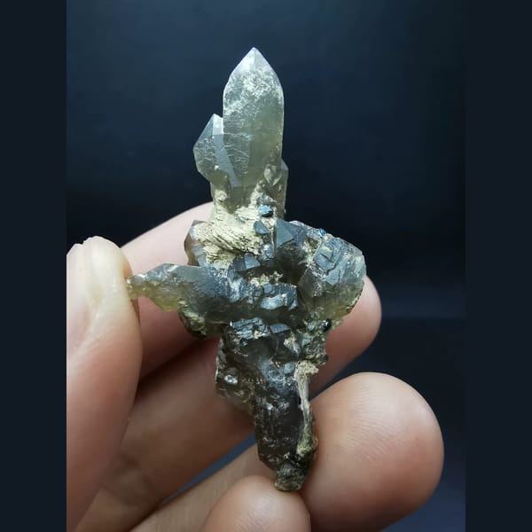 Smoky quartz crystal cluster — detail view