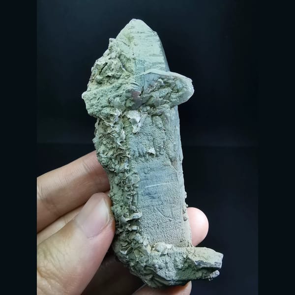 Double-terminated green-skin quartz with calcite — complete view