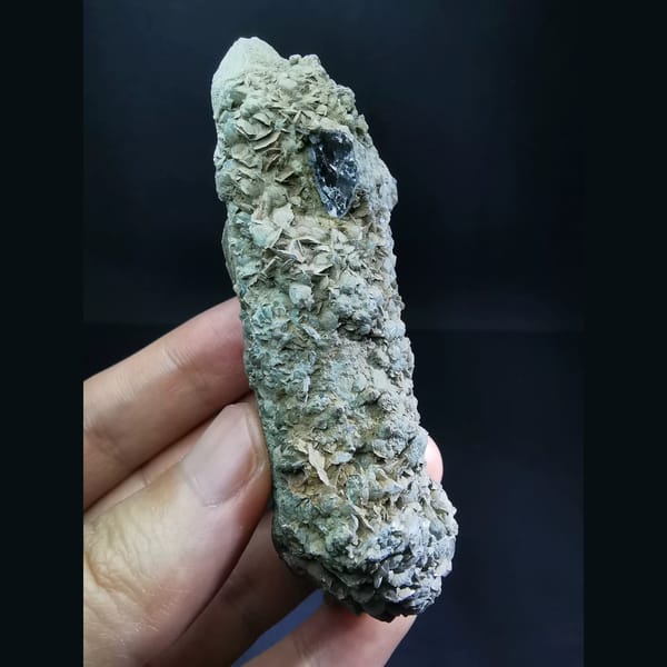 Double-terminated green-skin quartz with calcite — alternate view