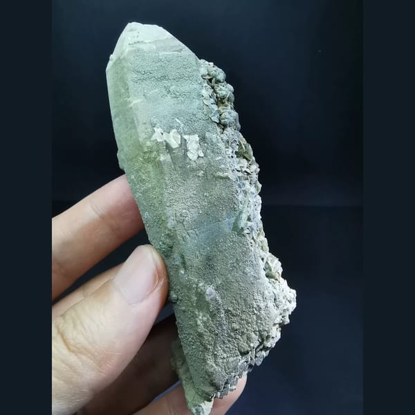 Double-terminated green-skin quartz with calcite — detail view