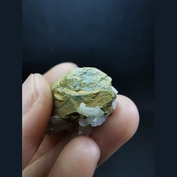 Floater yellow-skin quartz with white calcite flowers — detail view