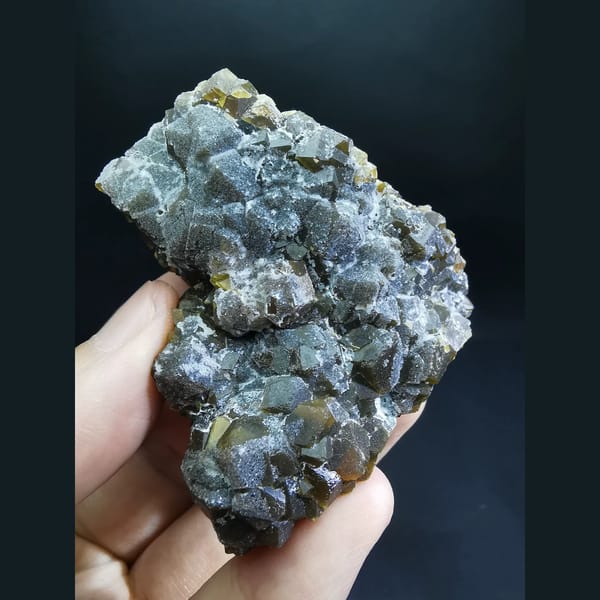 Sparkling sugary andradite garnet cluster — complete view