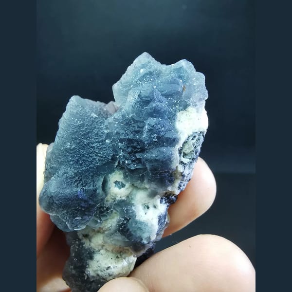 Blue octahedral fluorite with marmatite from Huanggangliang — detail view