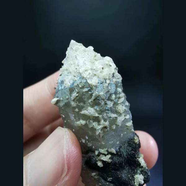 Alligator quartz with specular hematite and calcite — detail view