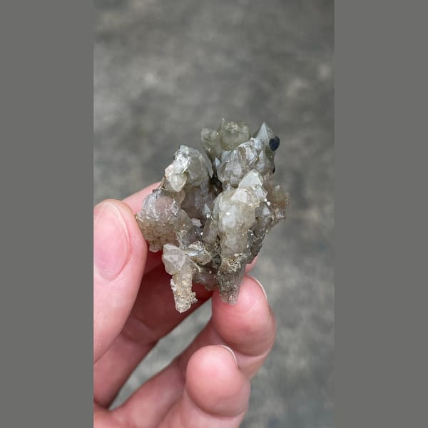 Small smoky grey quartz cluster from Inner Mongolia — complete view